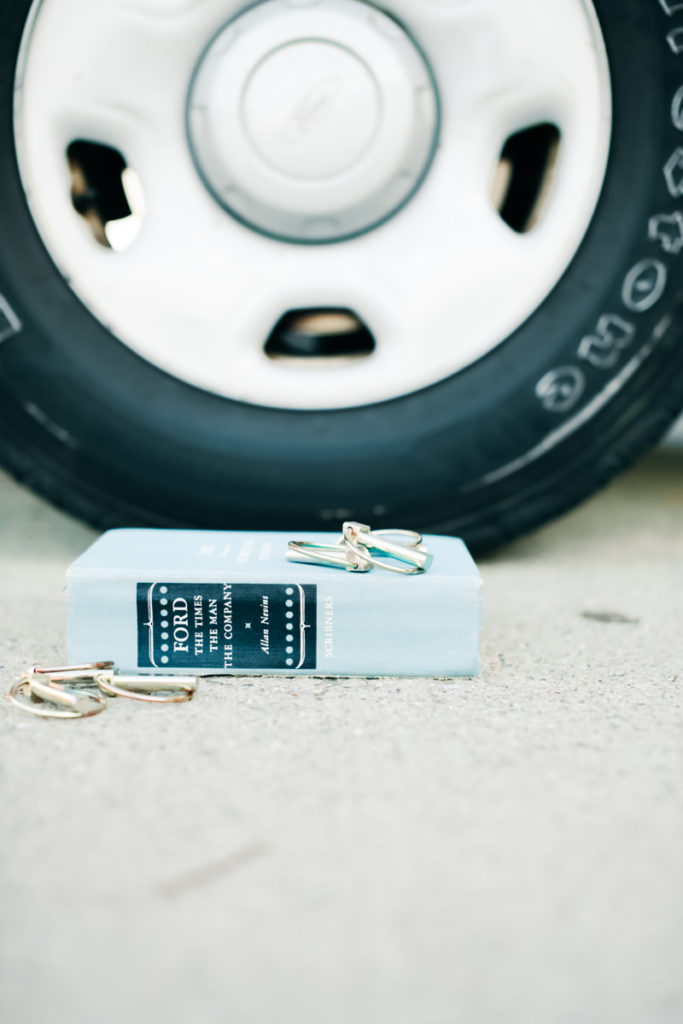 book next to tire with lynchpin